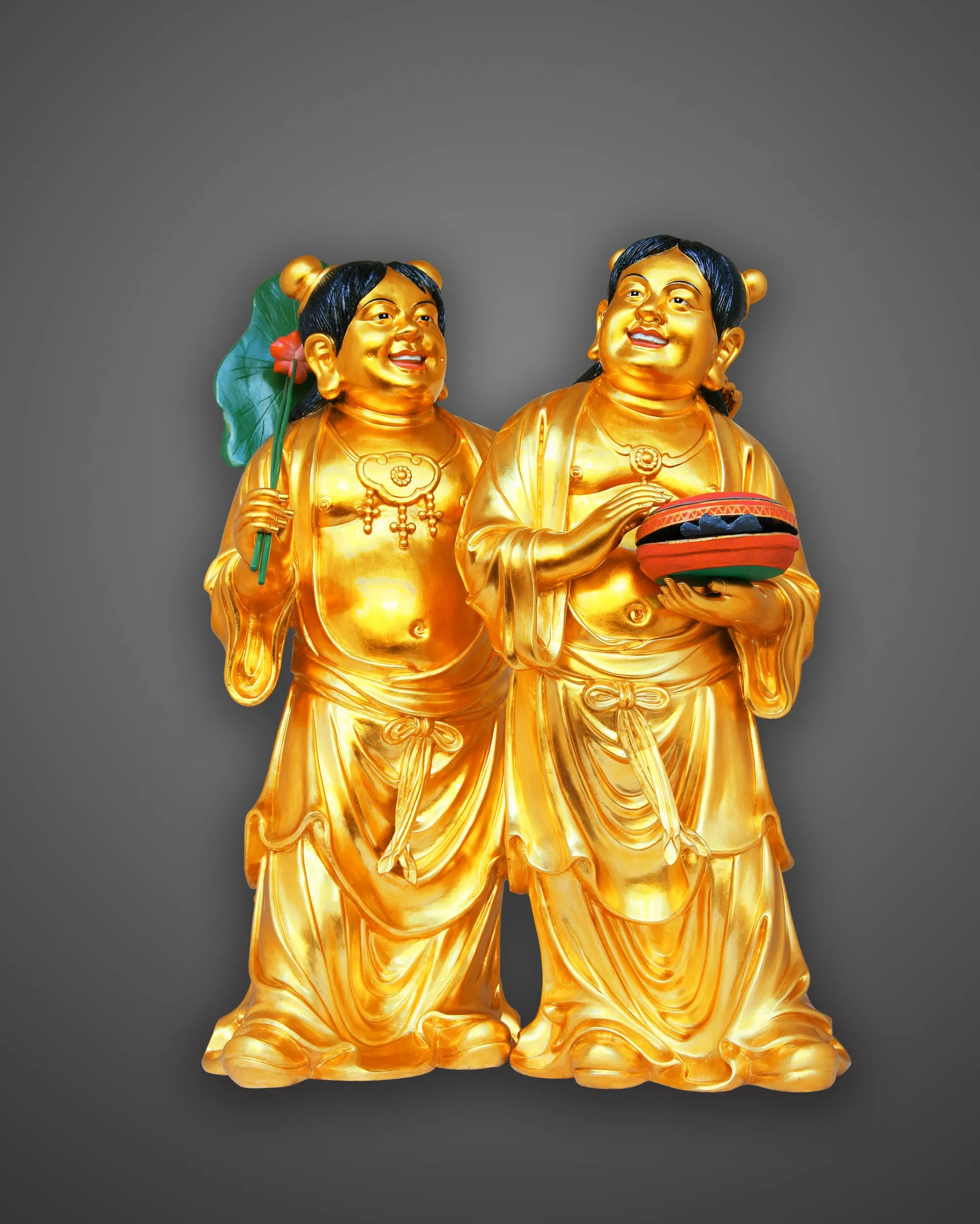 The same pair of Immortals of Harmony, finished in gold.
